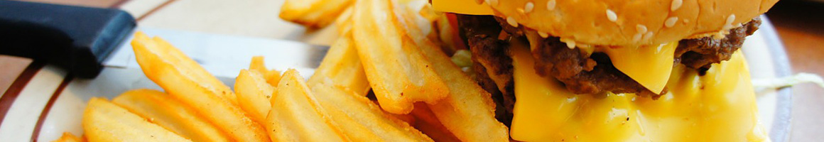 Eating Burger at The Station Burger restaurant in Berkeley, CA.